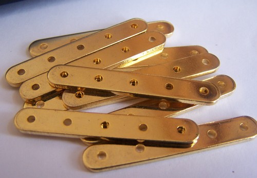 Image: connecteurs-or-5-trous-383c0b.jpg